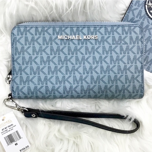 Michael Kors Handbags - MICHAEL KORS JET SET TRAVEL Blue Wallet Phone Case